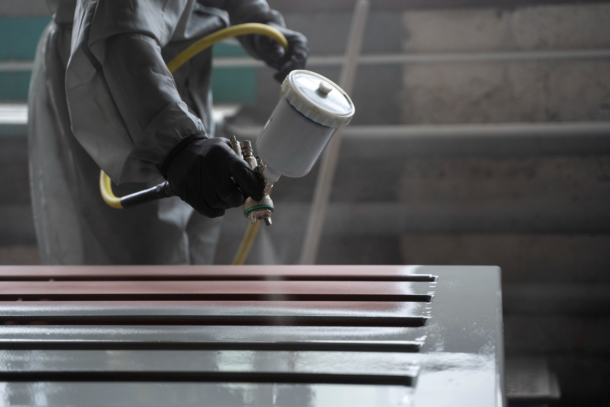 worker-spraying-from-gun